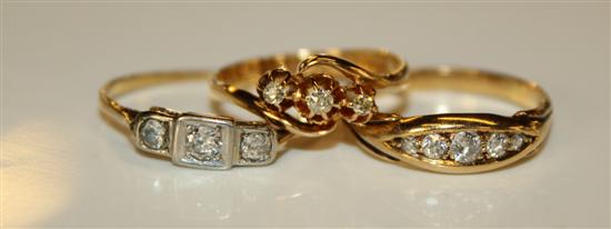 3 x 18ct gold & 3 stone diamond rings, one stone paste.